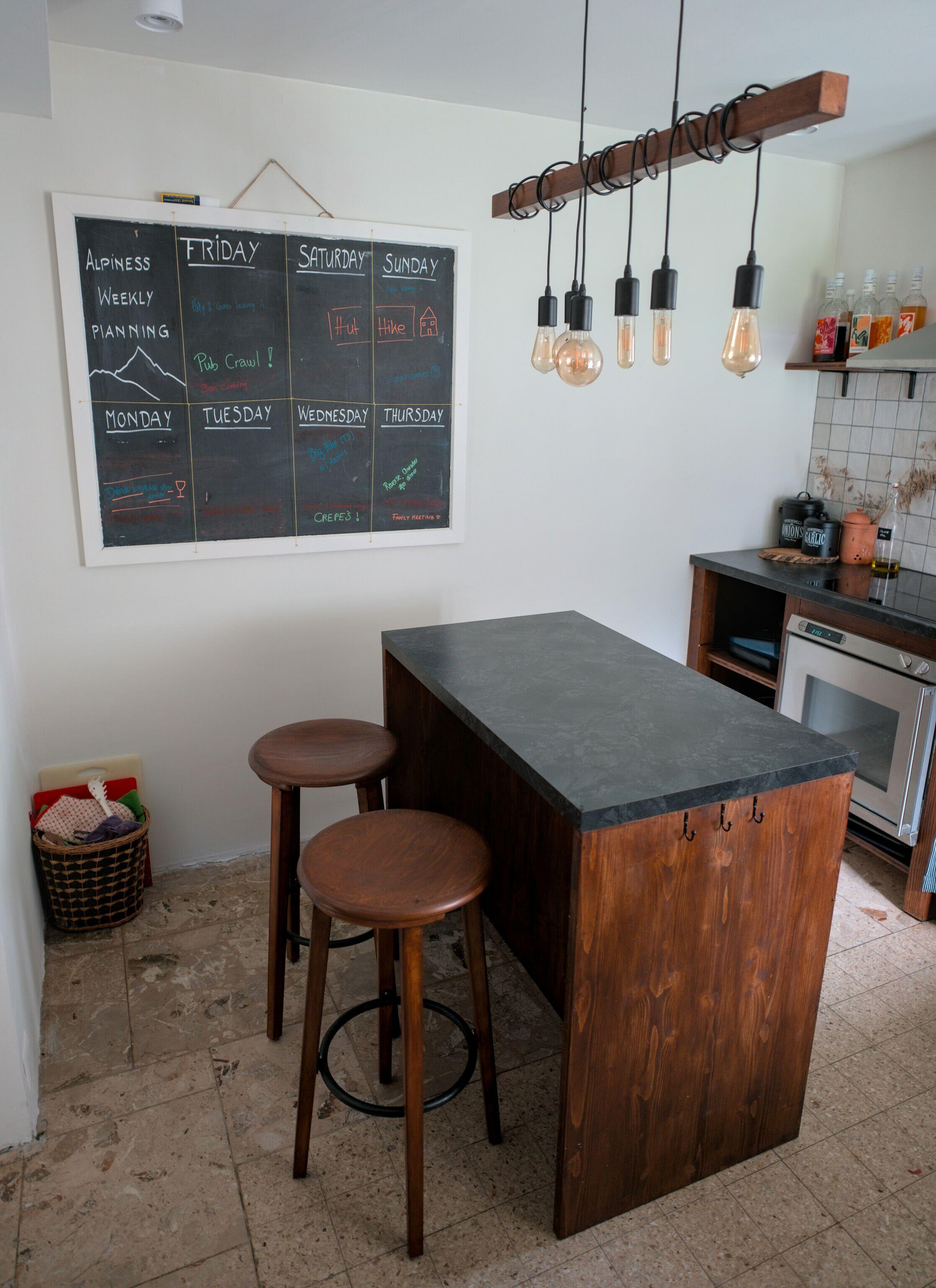 Another view of the Alpiness shared kitchen showing the layout and equipment.