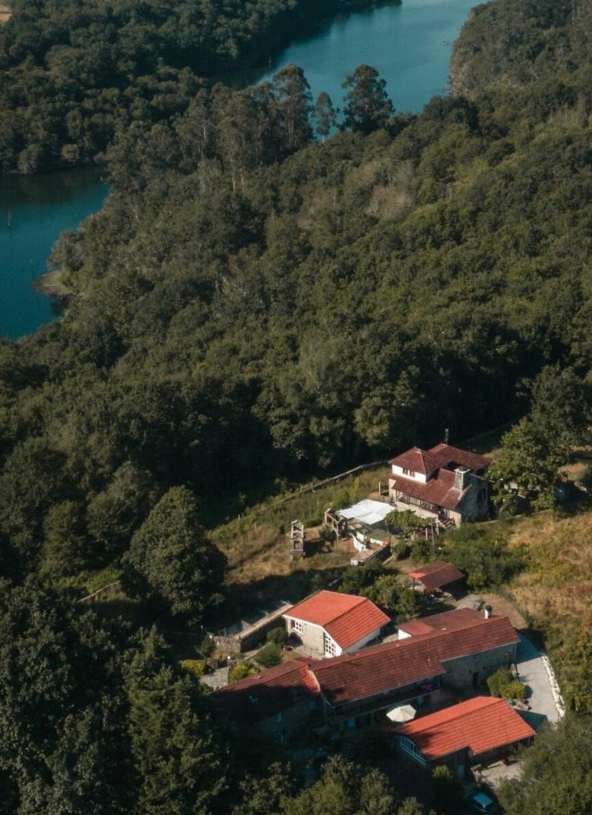 Aerial view of Anceu Coliving property showing the building and surrounding rural landscape