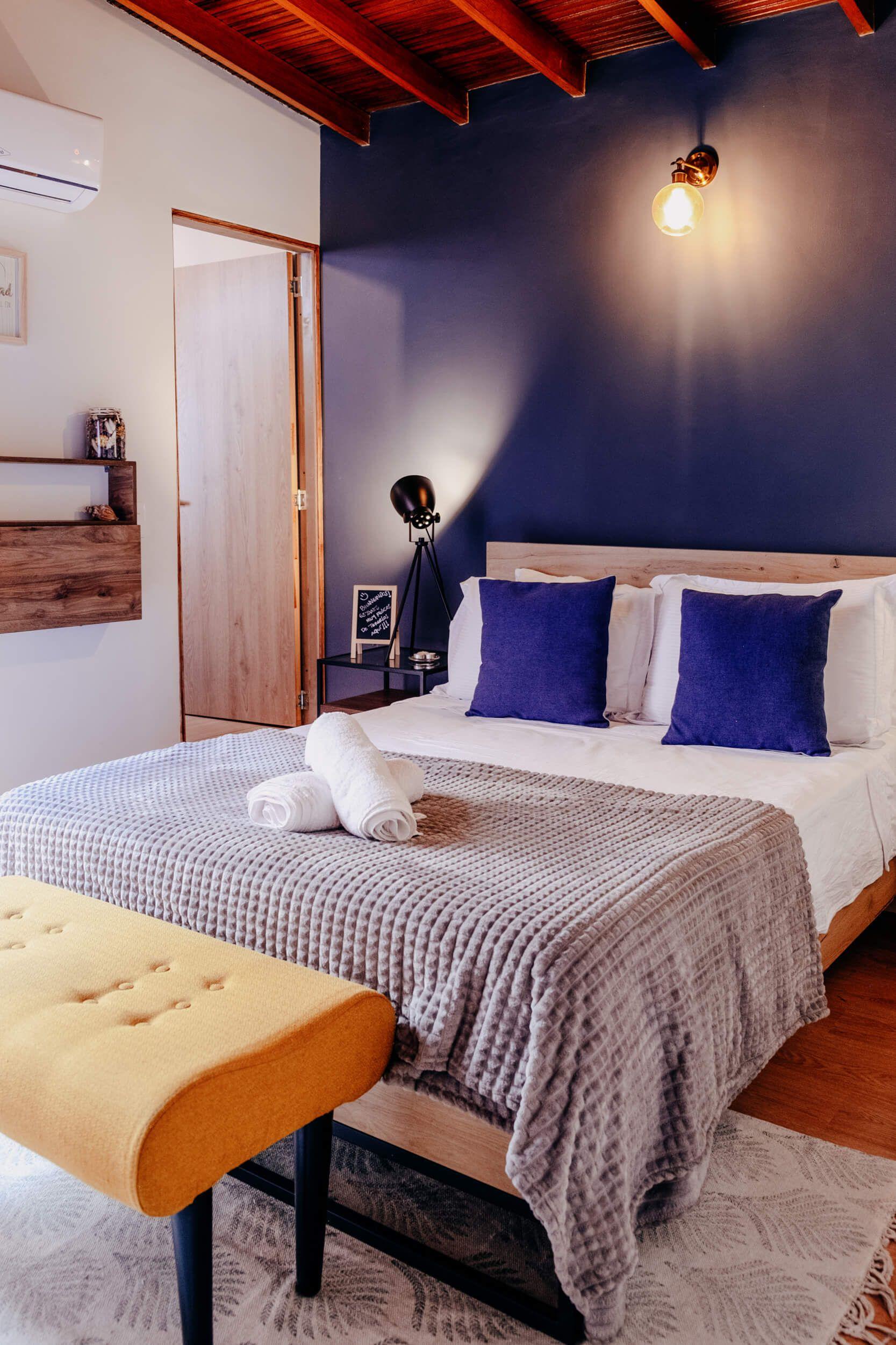 Main view of Bedroom 1 with a comfortable double bed and the largest wardrobe in the property