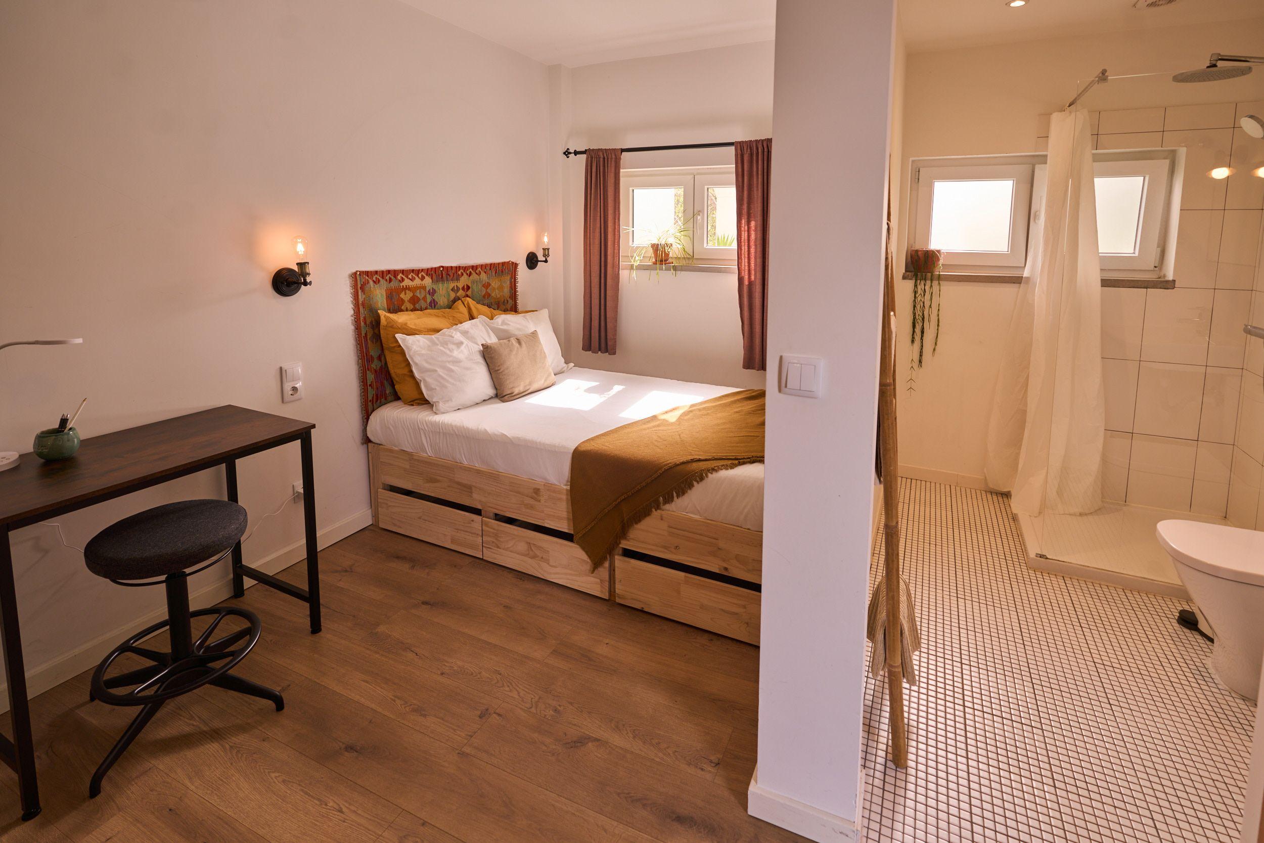 The Snug Pine room with cozy bed and natural light