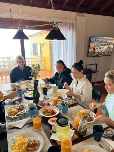Colivers enjoying a Sunday brunch together at the communal dining table
