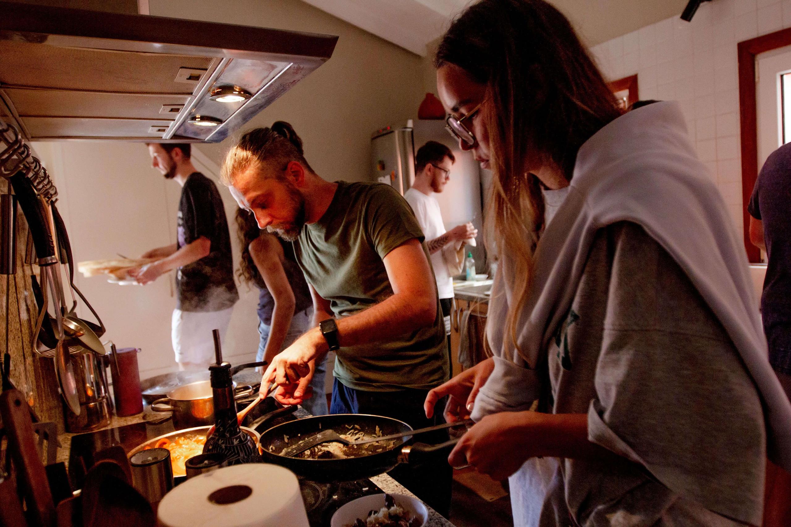Cactus Community making dinner together in the fully equipped kitchen
