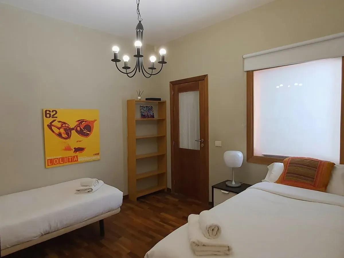2 comfy single beds in the female only shared room at Cactus Coliving Tenerife.