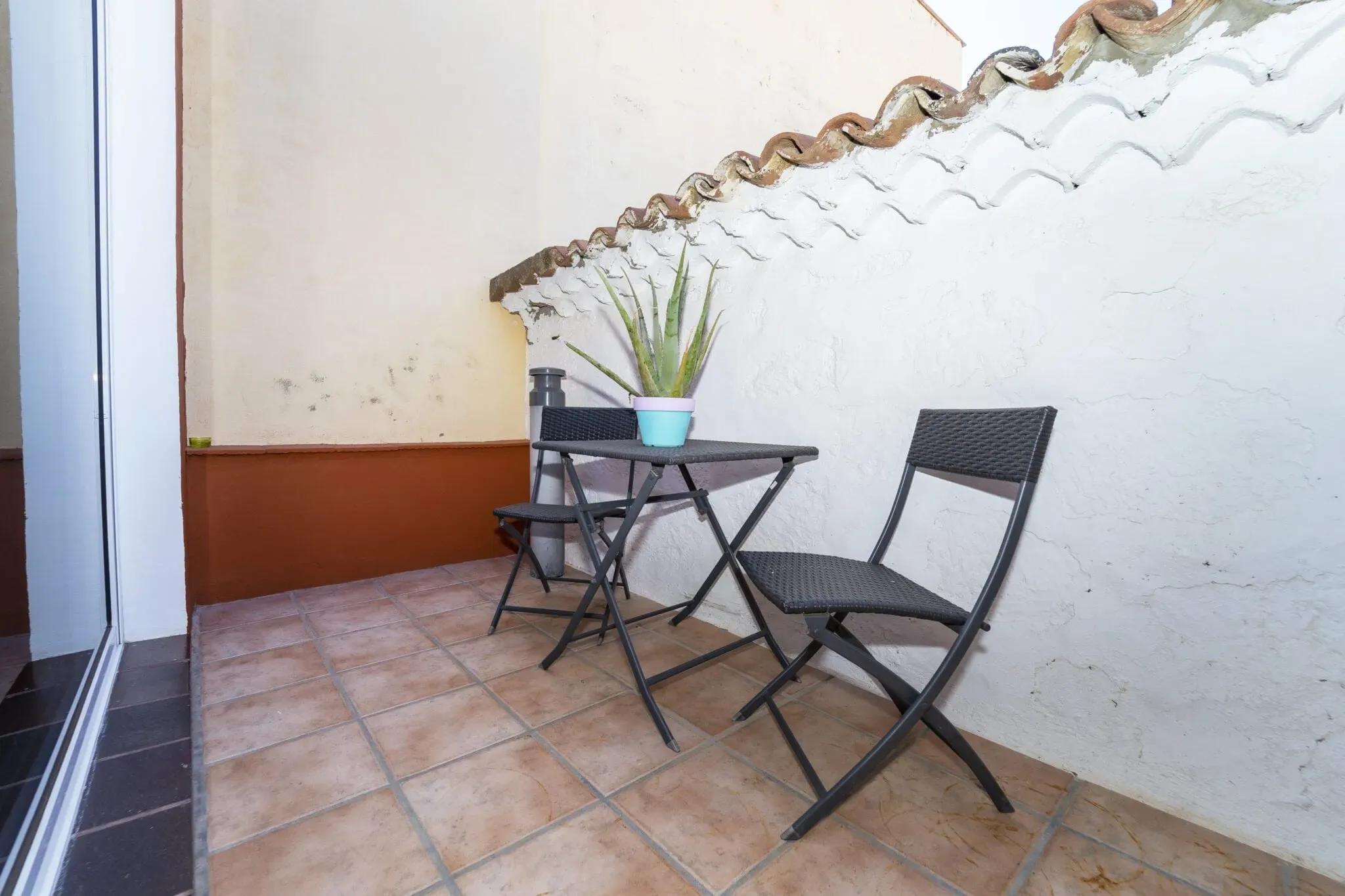 The terrace in one of the rooms on the top floor of Cactus Coliving Tenerife, a nice spot to work remote in privacy.