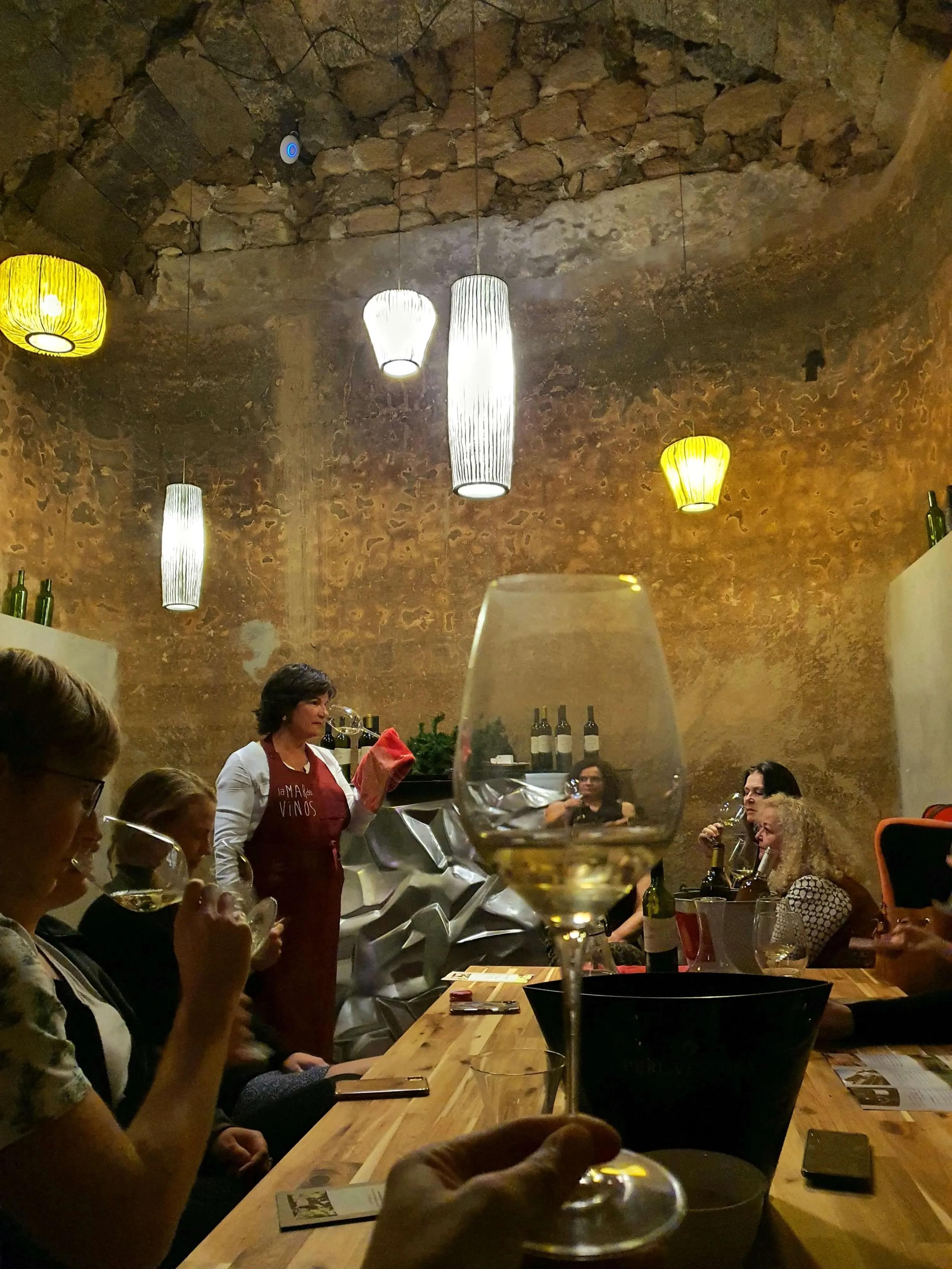 Digital Nomads from the coliving doing a local wine tasting in the cellar