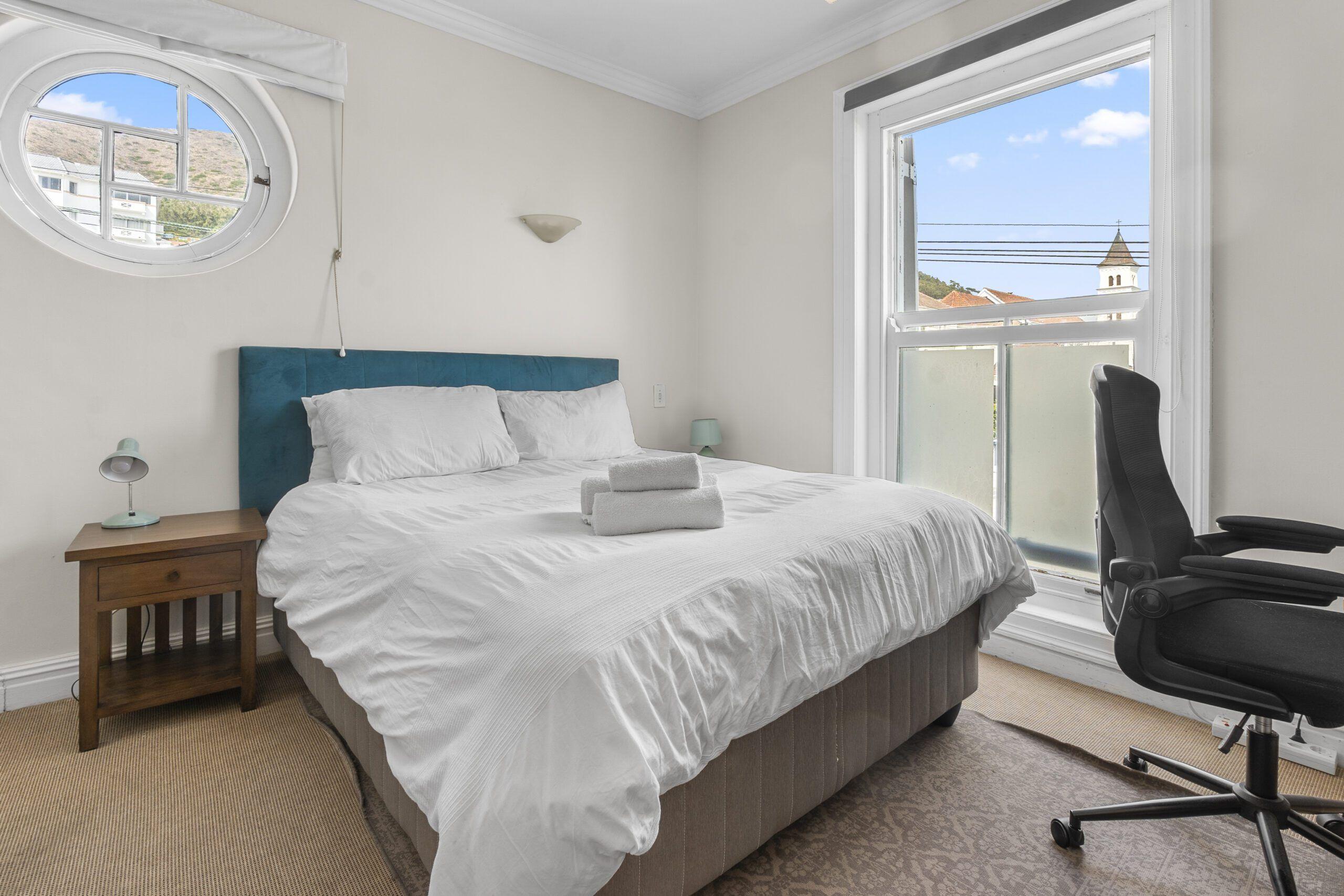 Queen-sized bed in the Hill Queen Suite