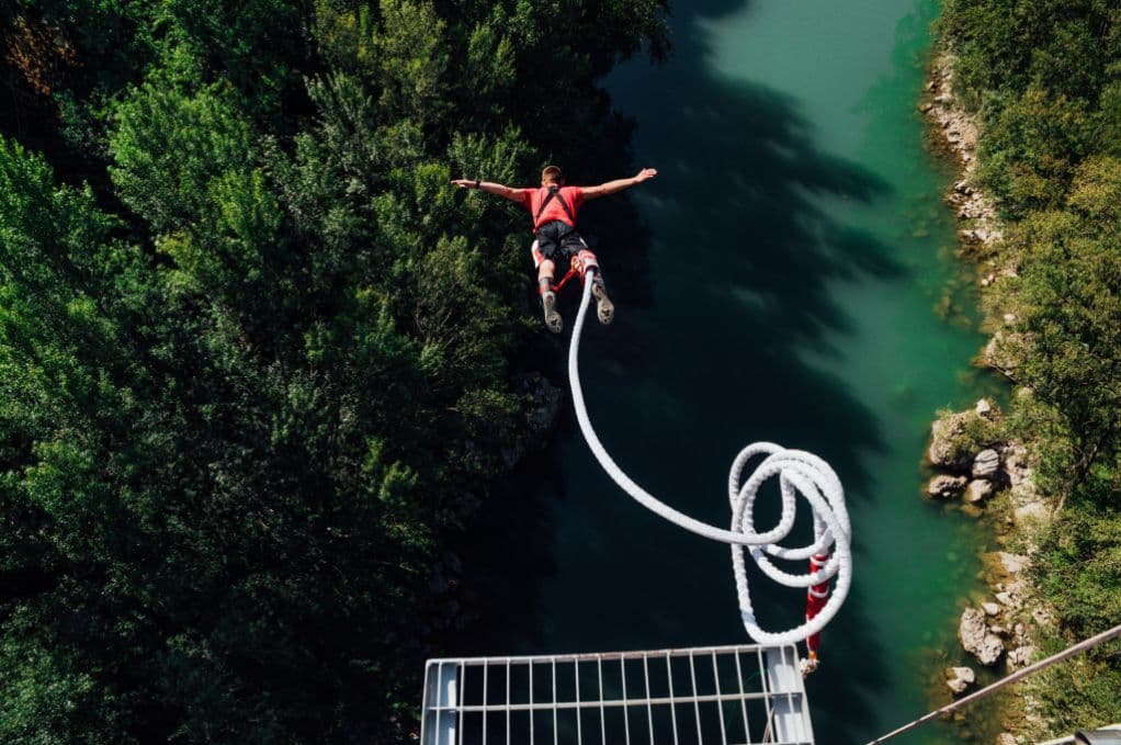 Bungee jumping off a 55-metre high bridge over the emerald Soča river in Solkan