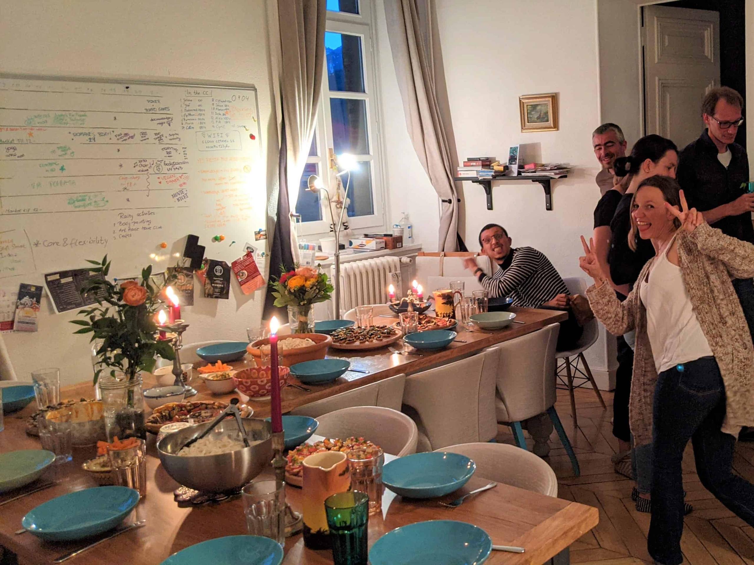 Dining room equipped with big wooden tables for family dinners and planning activities