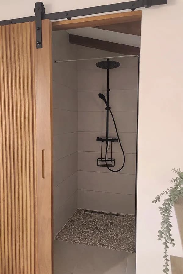 Coliving & Coworking Pool house industrial sliding door and bathroom with rain shower