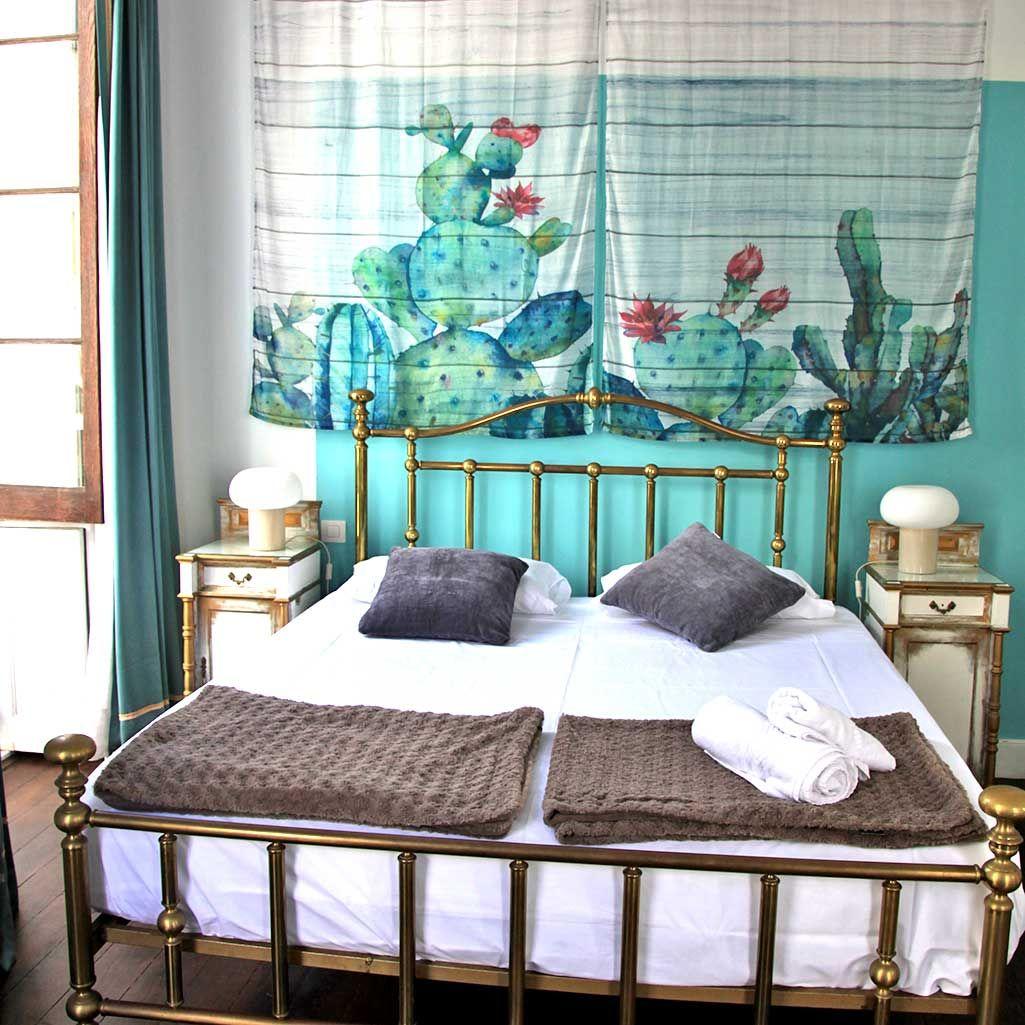 24 square meters room with 180 cm bed, private bathroom inside, first floor with balcony and natural light