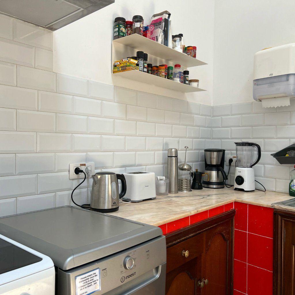 Fully furnished and equipped kitchen with oven, dishwasher, microwave, coffee machine, kettle, two fridges, two freezers and storage space