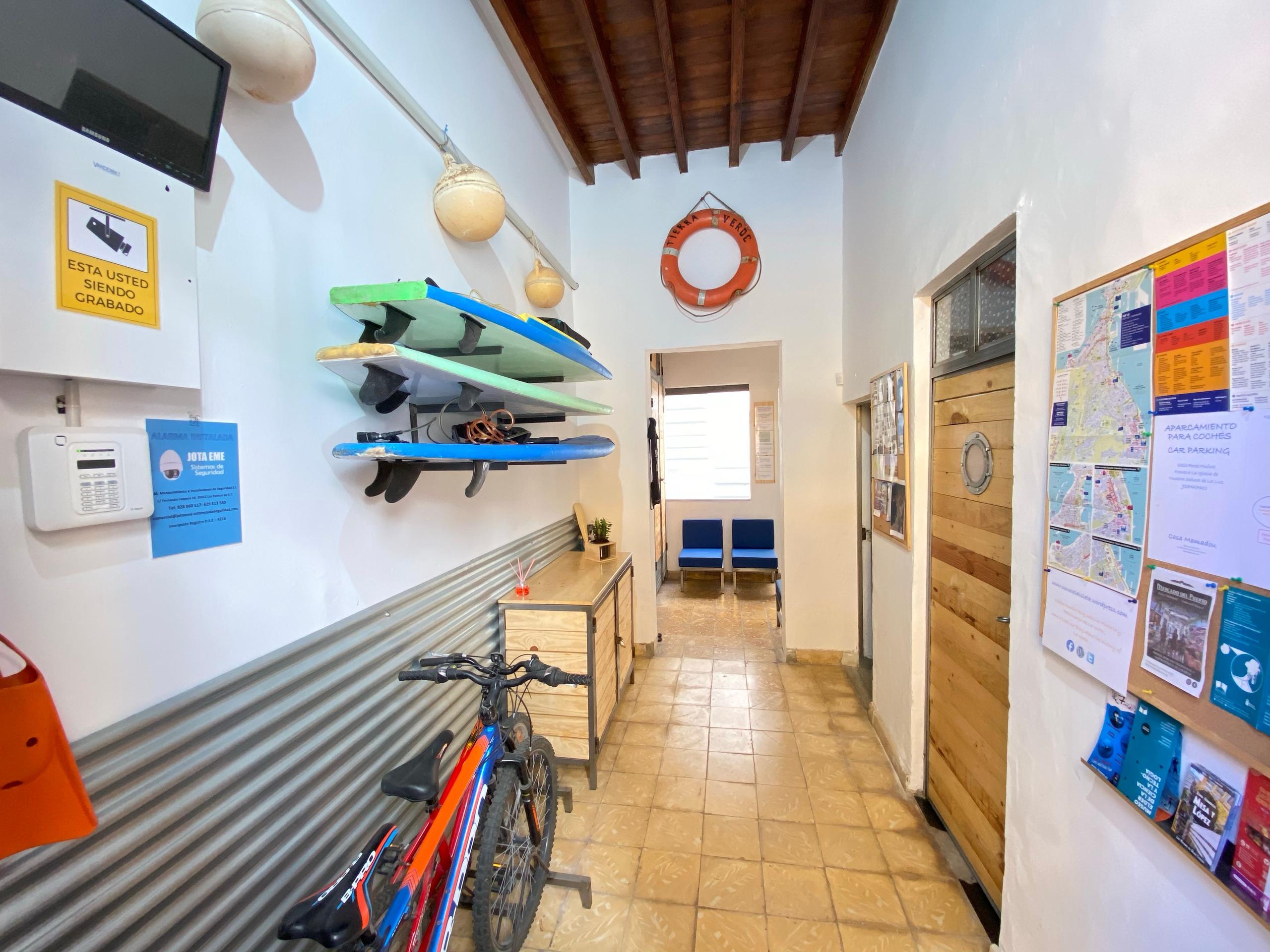 Main entrance in a Coliving in Gran Canaria near the beach, Surf and bikes in the house. View of the main entrance.