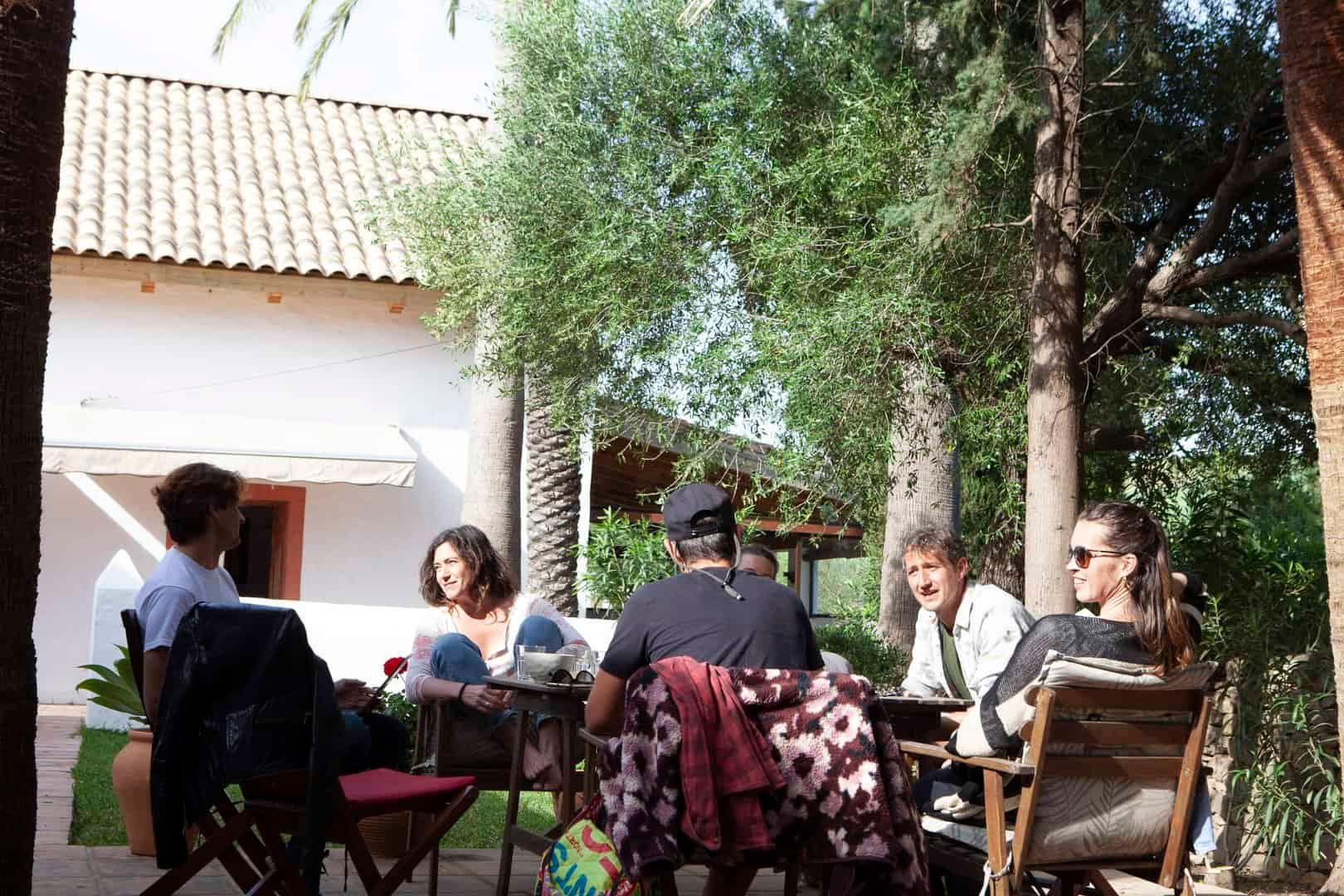 People working at the communal coworking table