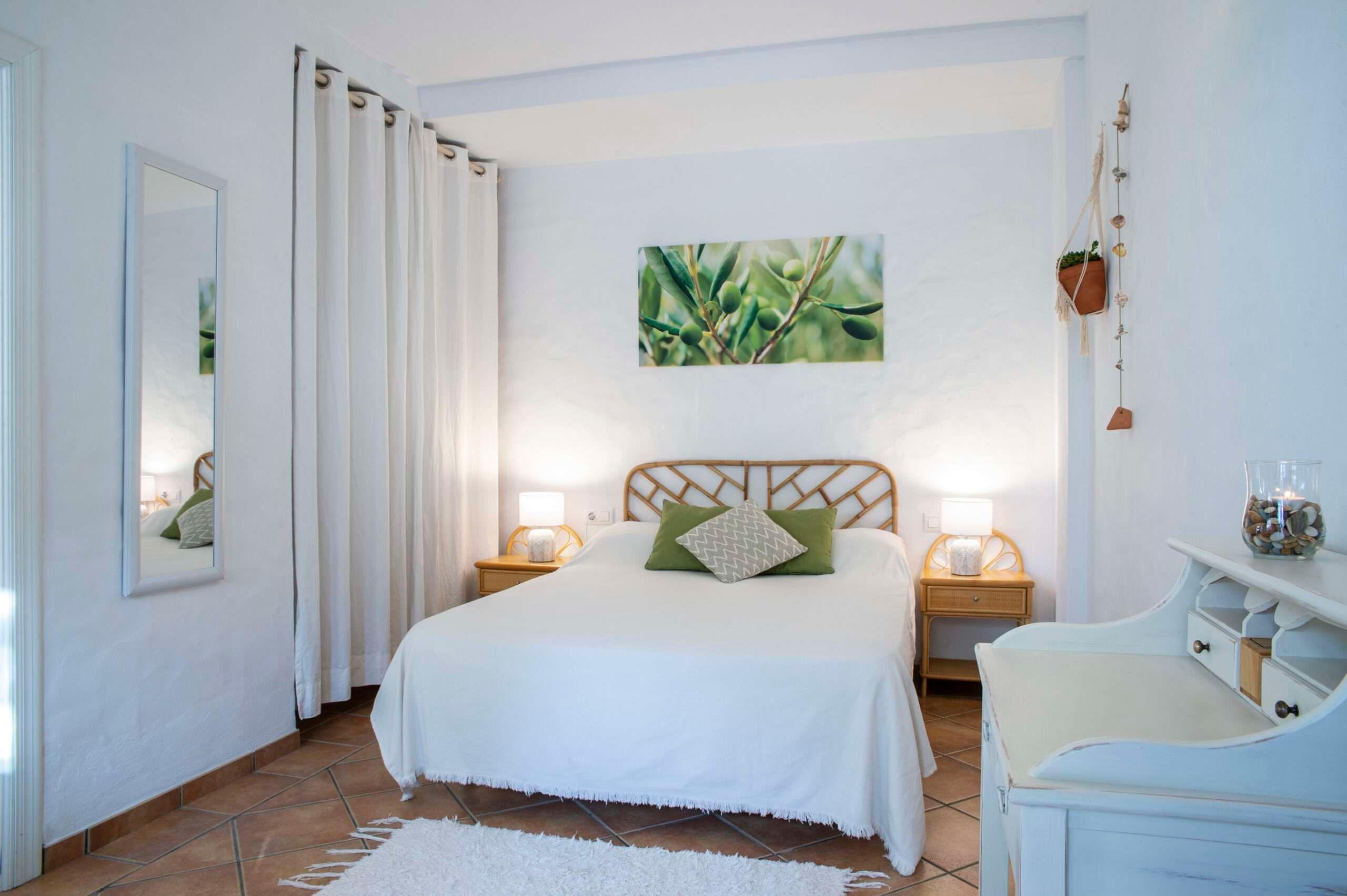 room with a double bed and decoration