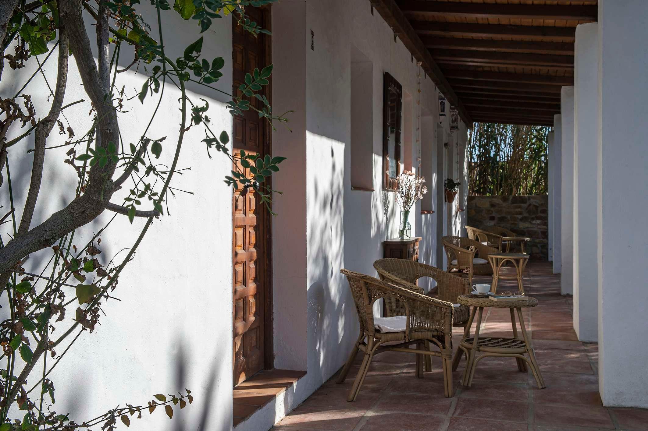 covered terrace with garden furniture