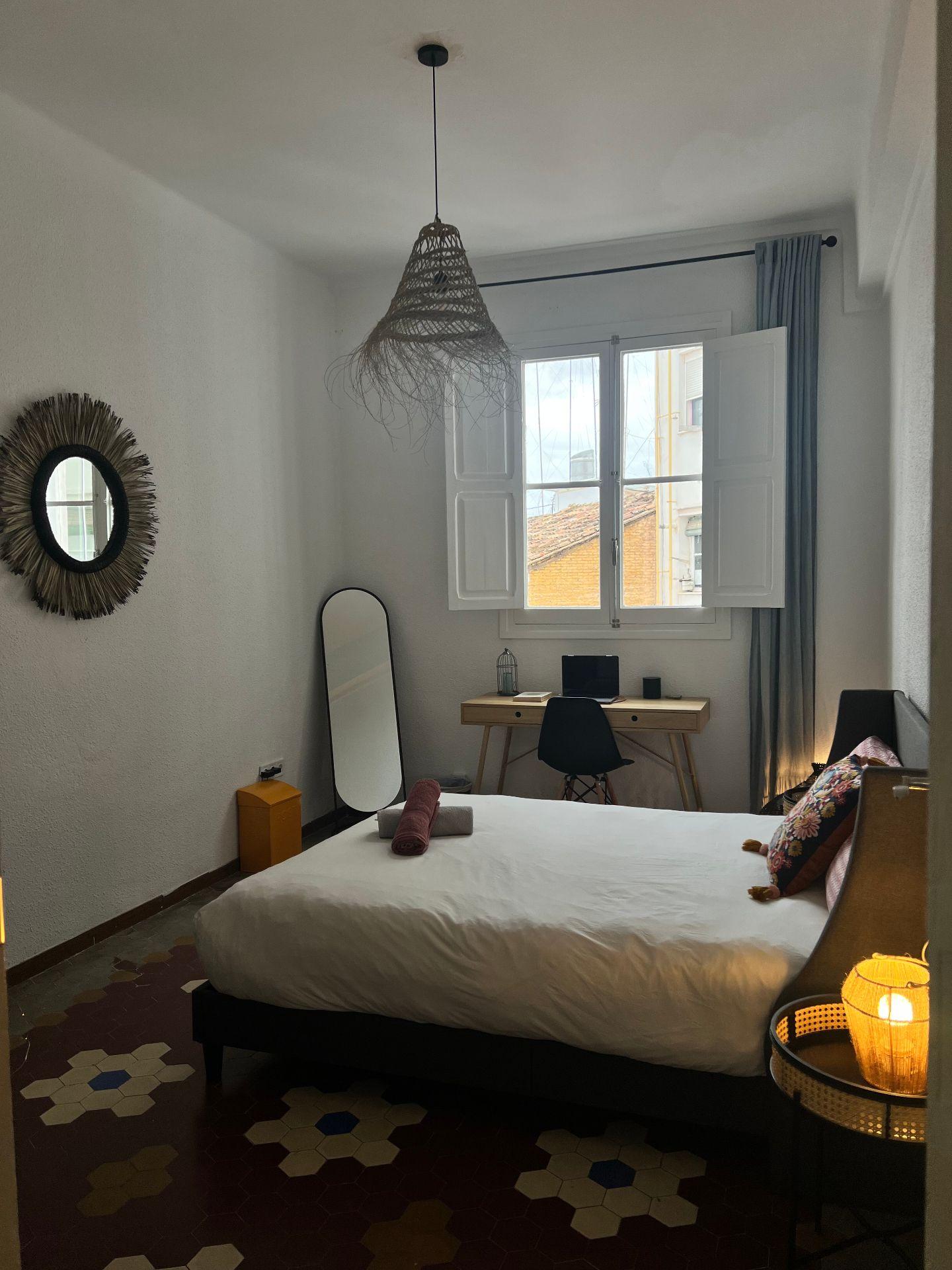 A well-lit, stylish space with AC and large wardrobe, ideal for peaceful mornings