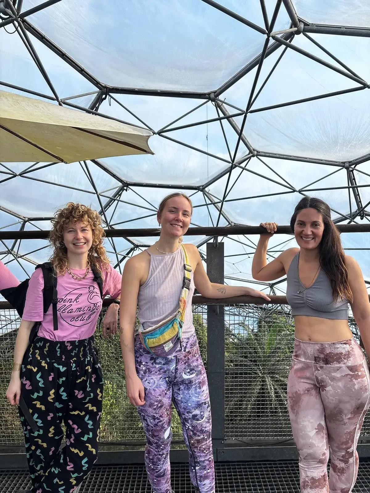 Three Froomies residents posing inside the Eden Project biomes in Cornwall