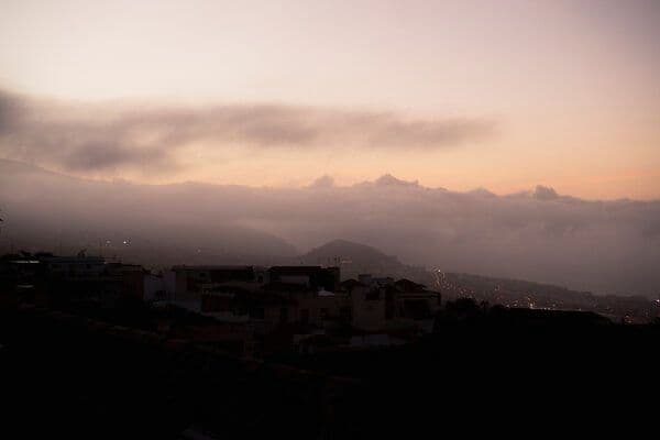 Dramatic sunset view over La Orotava town and surrounding mountains, seen from the property