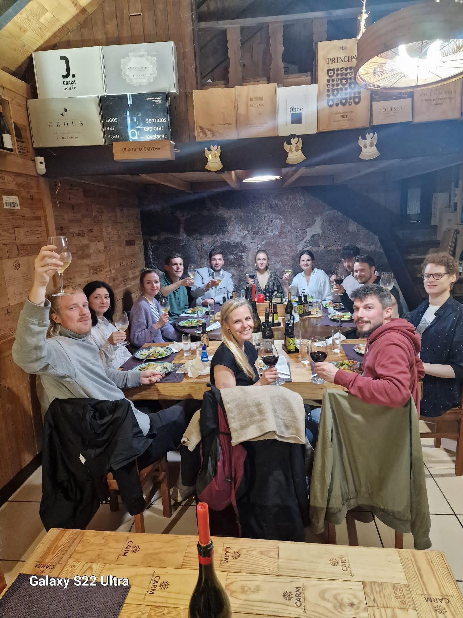 Homeoffice Madeira guests embark on an exciting group excursion to a hidden, off-the-beaten-path restaurant, uncovering local culinary treasures and bonding through their shared experience.