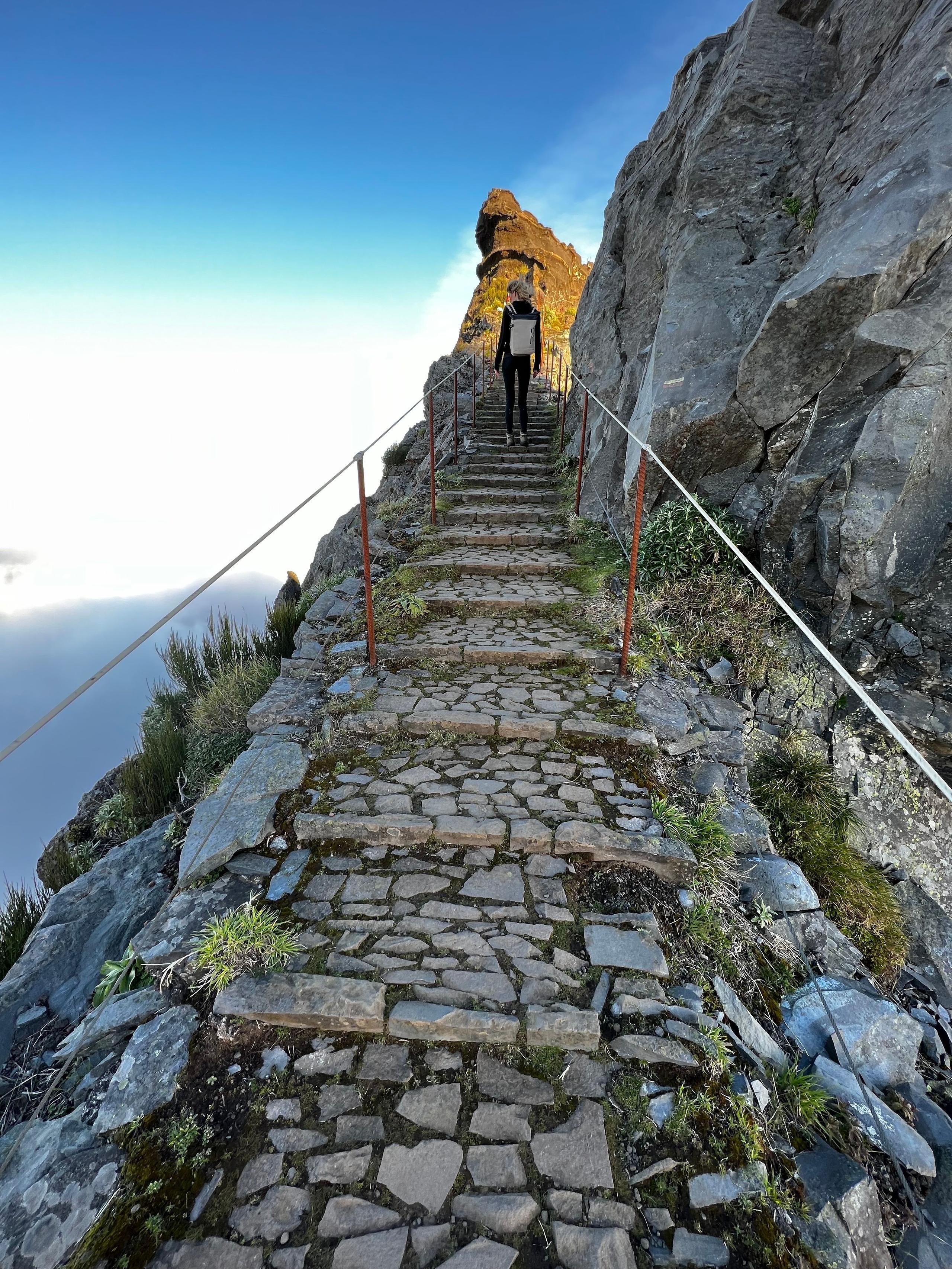 View of the Stairway to Heaven hike on Madeira, showcasing the dramatic cliffs and lush greenery along the trail towards Pico Ruivo.