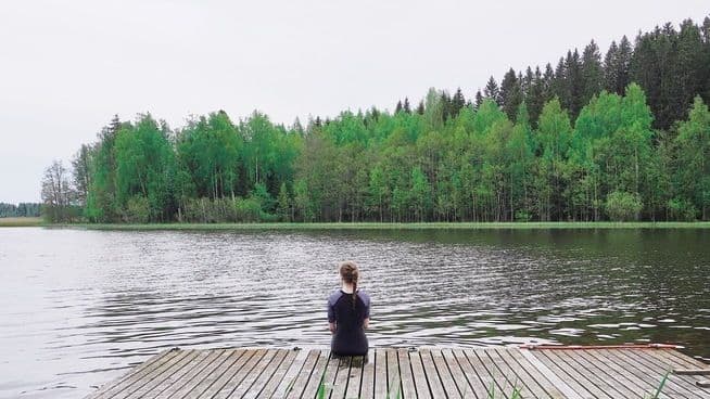 Person by the lake near Hub Feenix