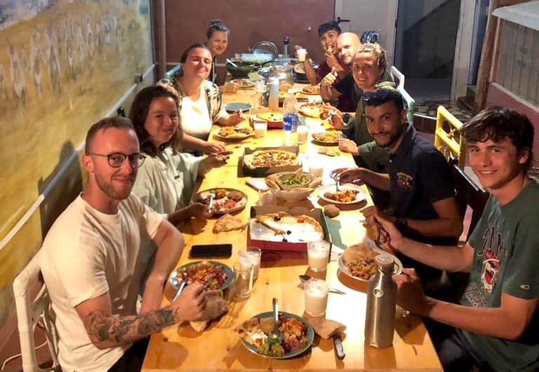 Community potluck dinner at Kasbari coliving