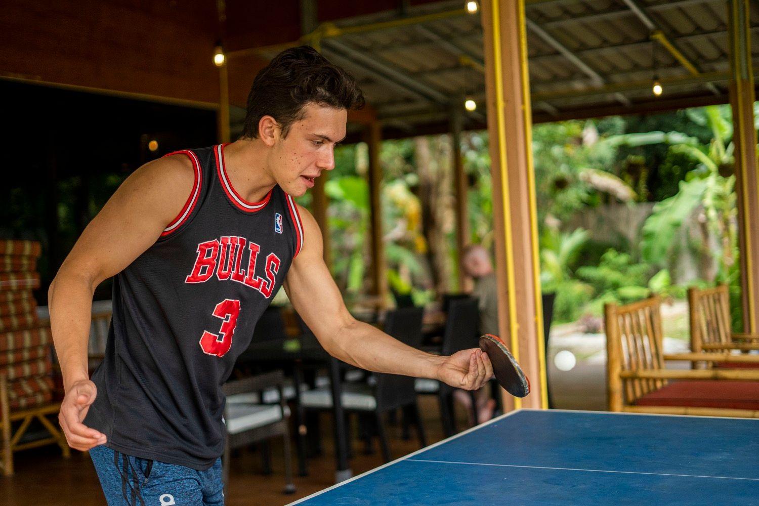 Member playing table tennis at KoHub