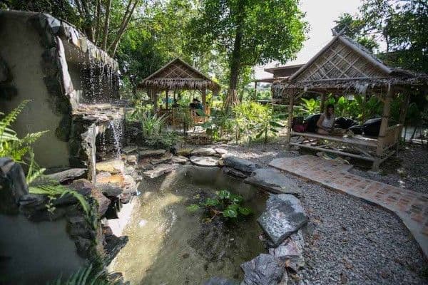 The Zen Zone situated in the center of the tropical garden with waterfall