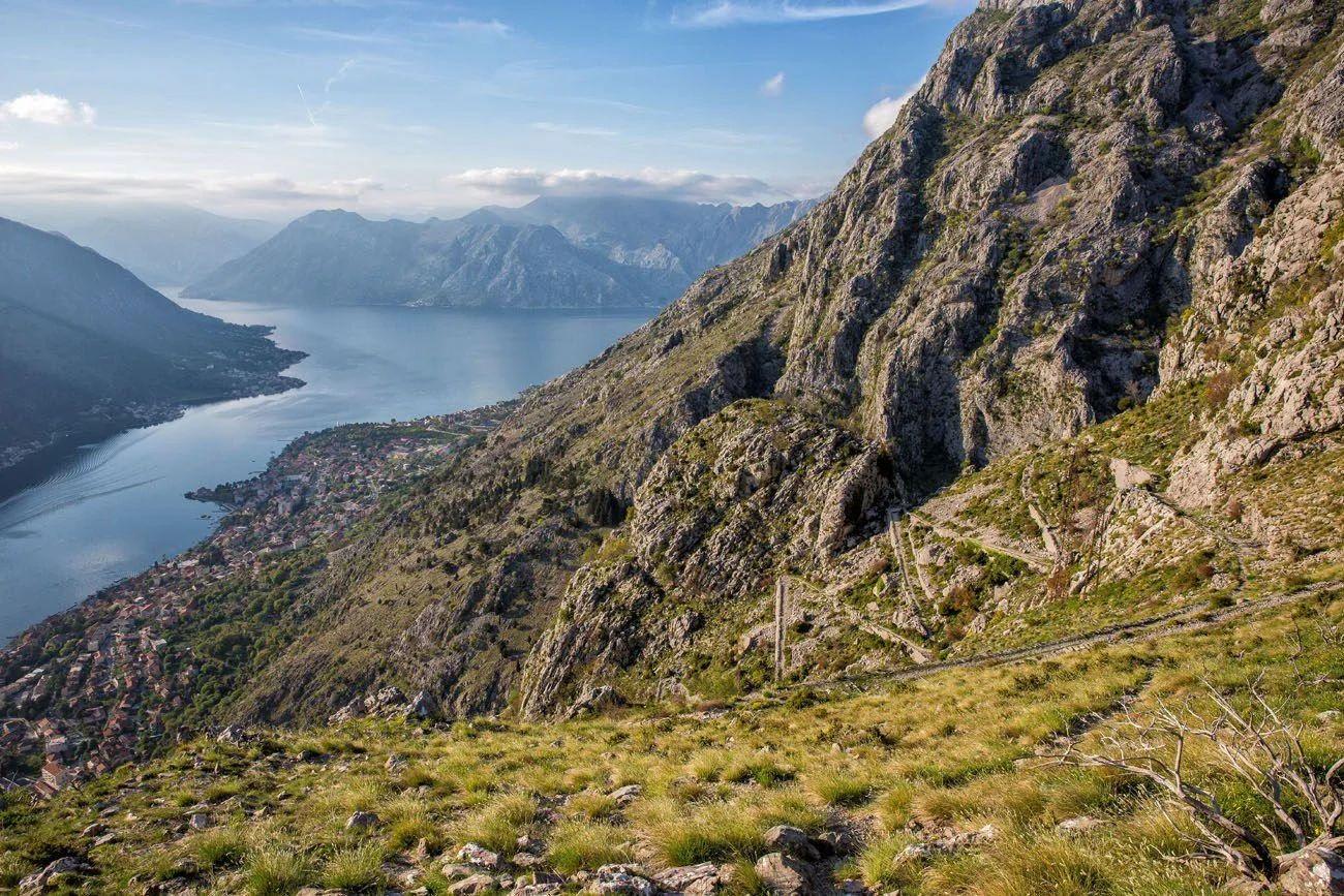 The Ladder of Kotor hiking trail with serpentine road winding up the mountainside