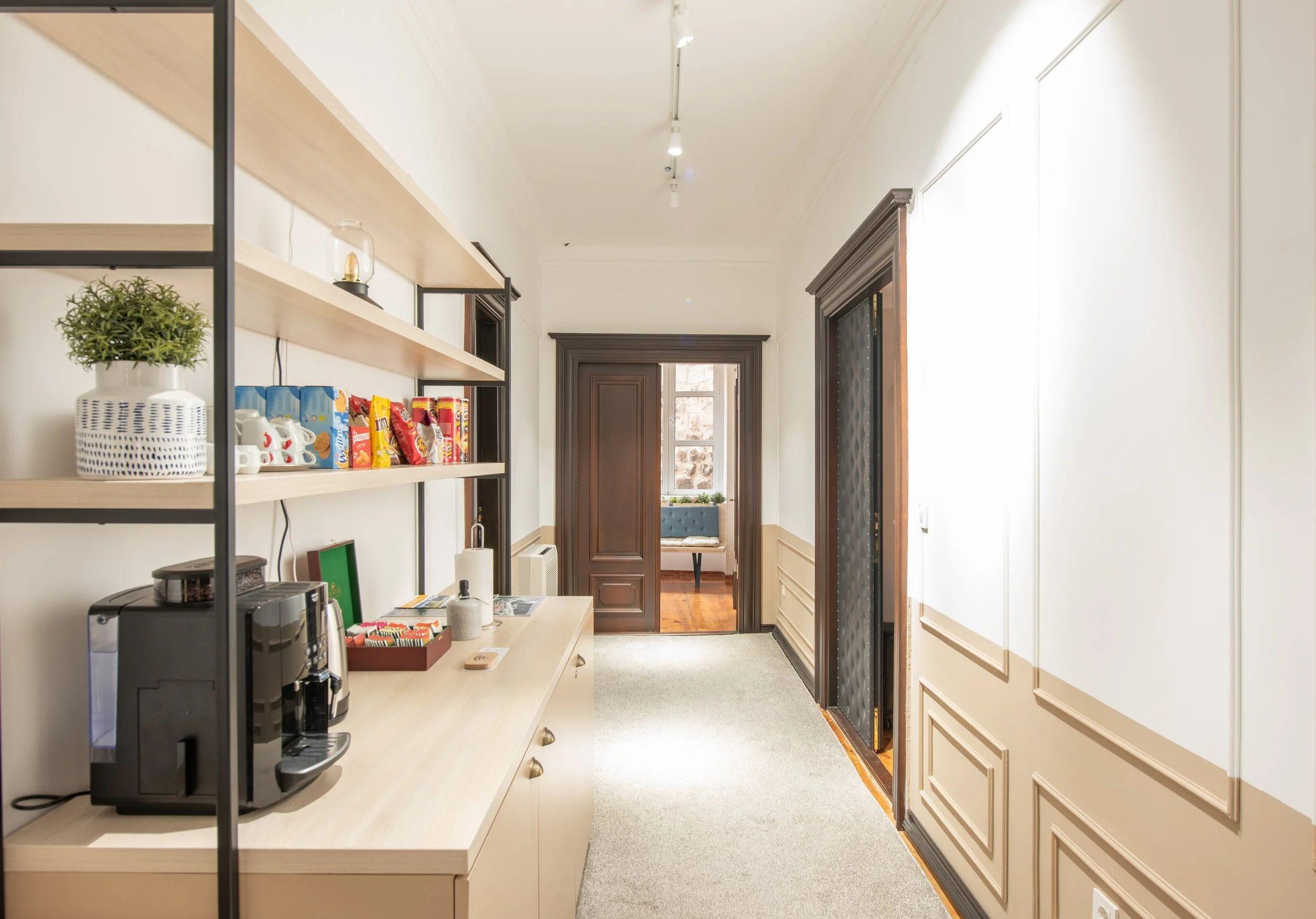 Common living room and kitchen area at Kotor Nest