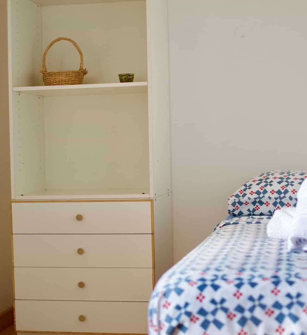 Cozy single room with minimalist decor in Masseria Olga coliving space in Italy