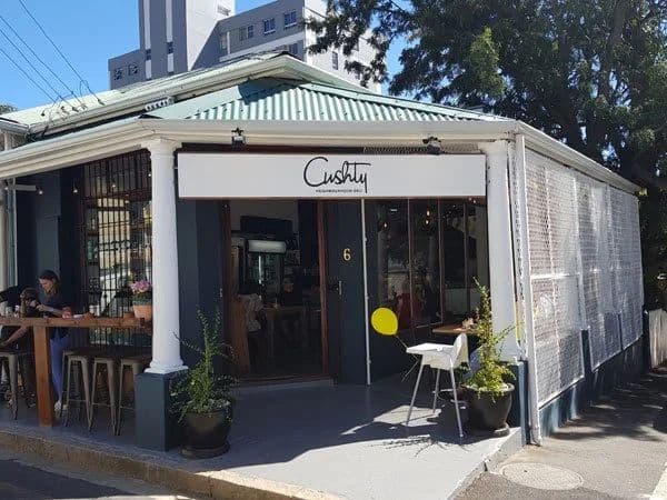 Exterior of Cushty Neighbourhood Deli, the café next door to Ravenscraig in Green Point