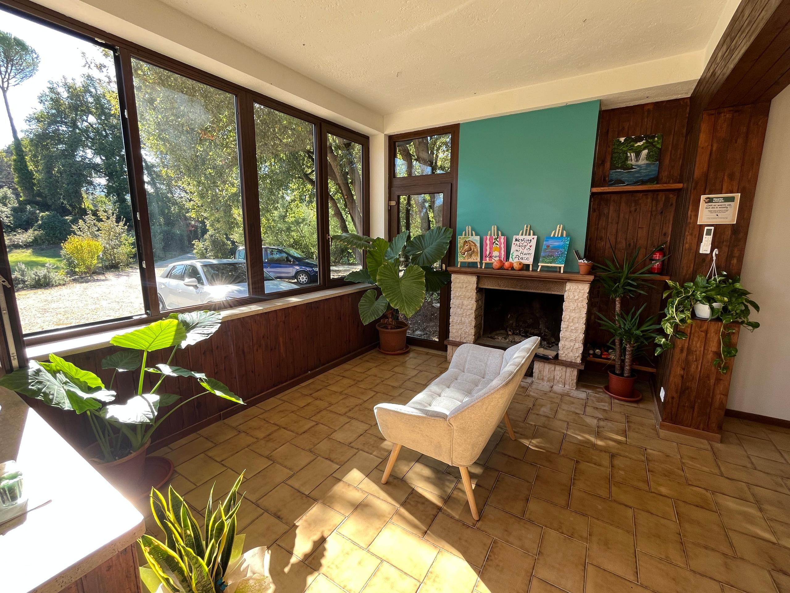 Cozy reading spot in the coworking space at a coliving in Italy near Rome