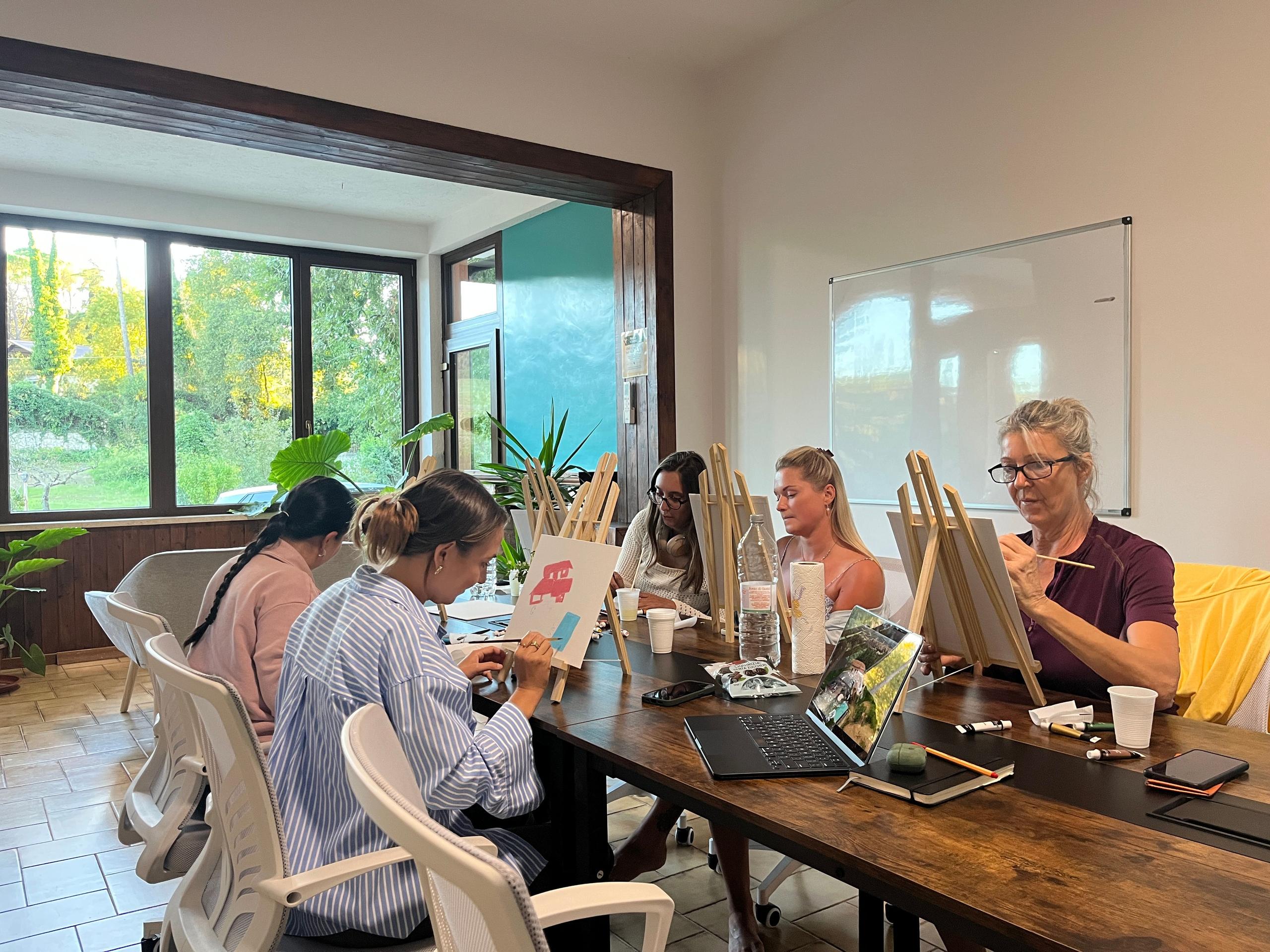 Dedicated coworking space at coliving Italy with fast WiFi and quiet environment for remote workers