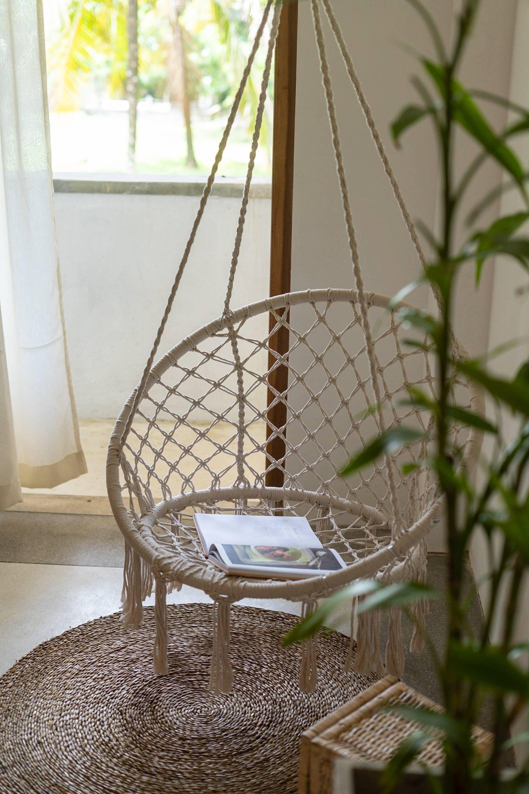 Elegant swing in the Chic Suite room at NETS Cowork and Colive, with modern decor and a relaxing atmosphere.