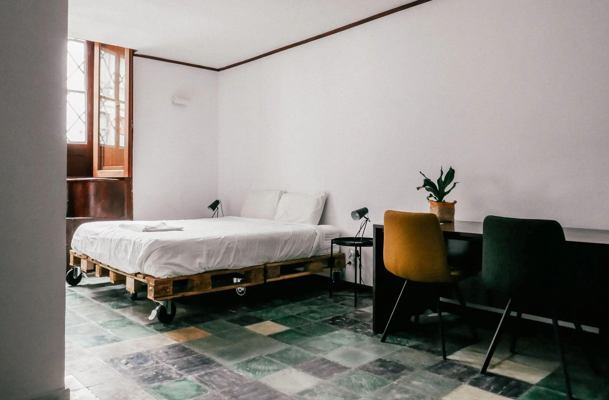 A double bedroom with ensuite bathroom at Nine Coliving.