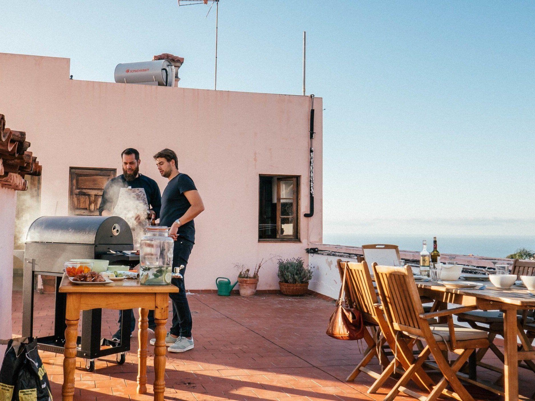 Residents Jan and Ethan at a BBQ at Nine Coliving.