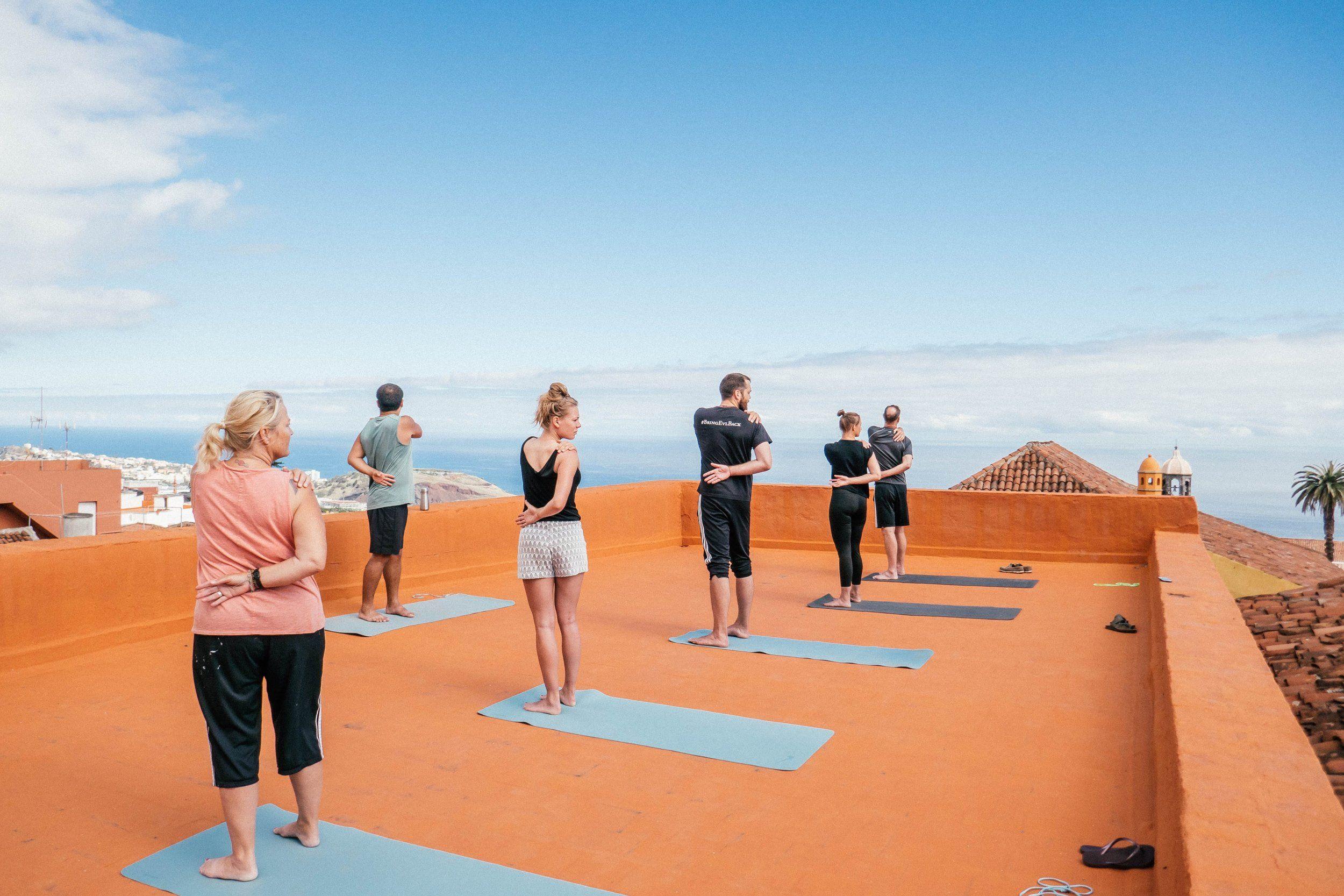 Yoga session on the rooftop of Nine Coliving.