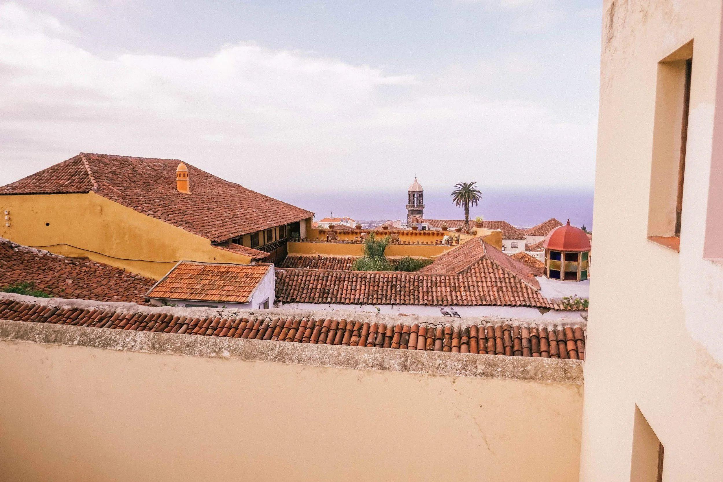 Scenic view from Nine Coliving over the town and sea.