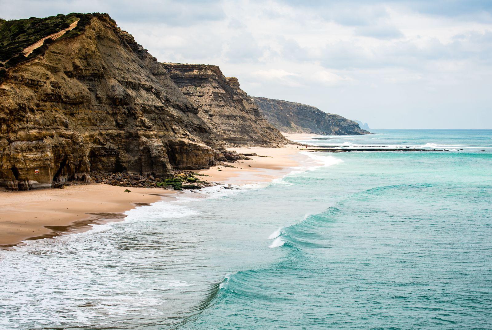 Dramatic coastal cliffs and turquoise ocean near Ericeira