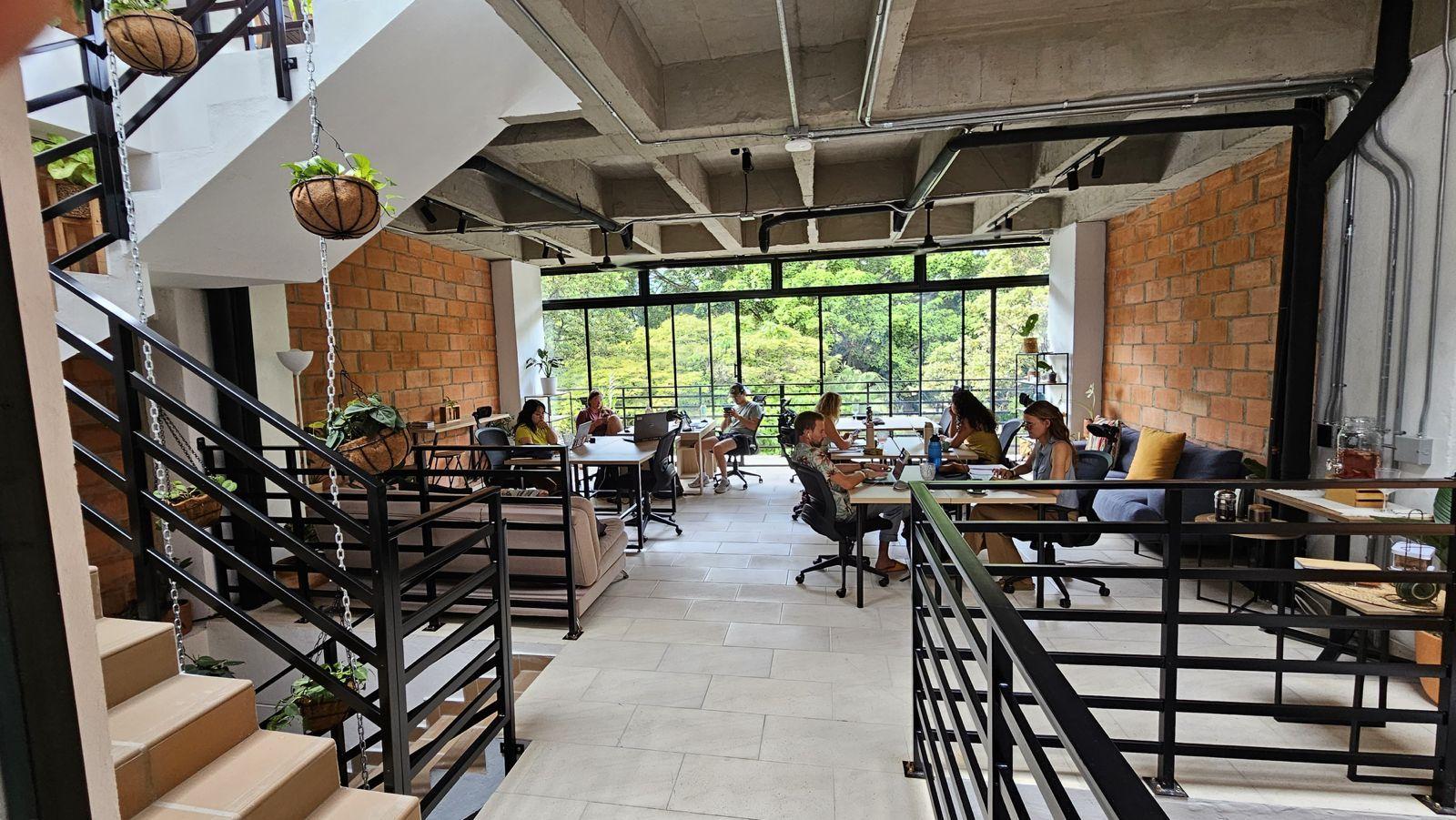 Focus time — resident working at a desk in the coworking space