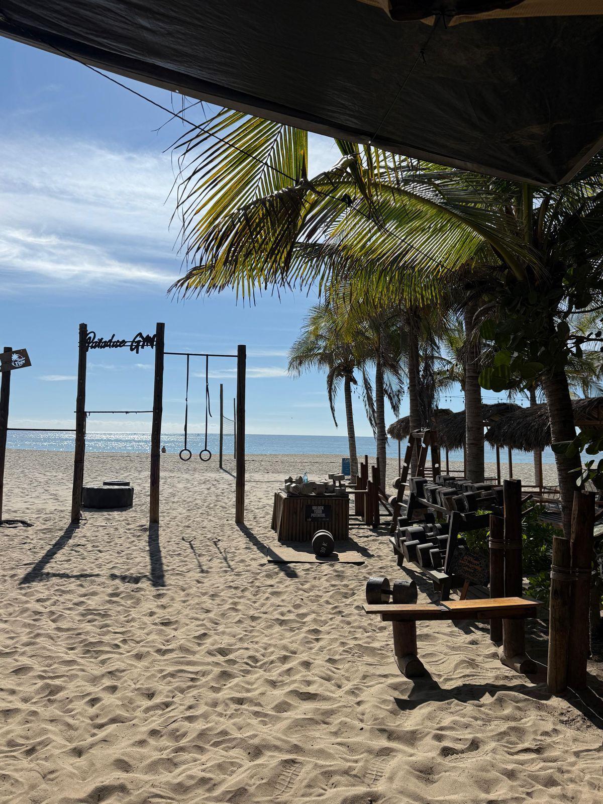 Outdoor beach gym with pull-up bars and gymnastic rings at La Punta, Puerto Escondido