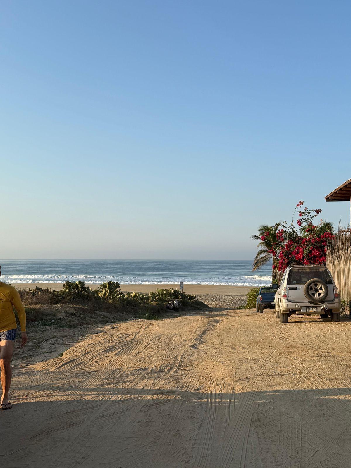 Sandy road leading to the beach in Puerto Escondido