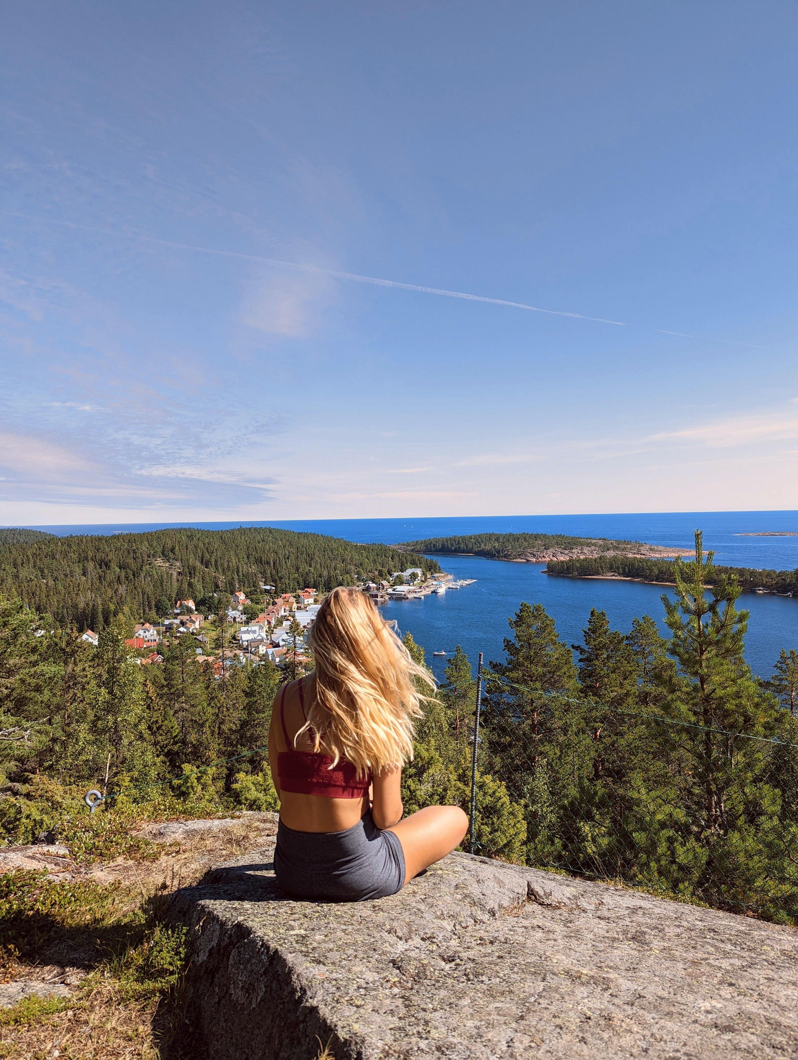 View on Ulvöhamn, a red-housed fishing village in the Höga Kusten