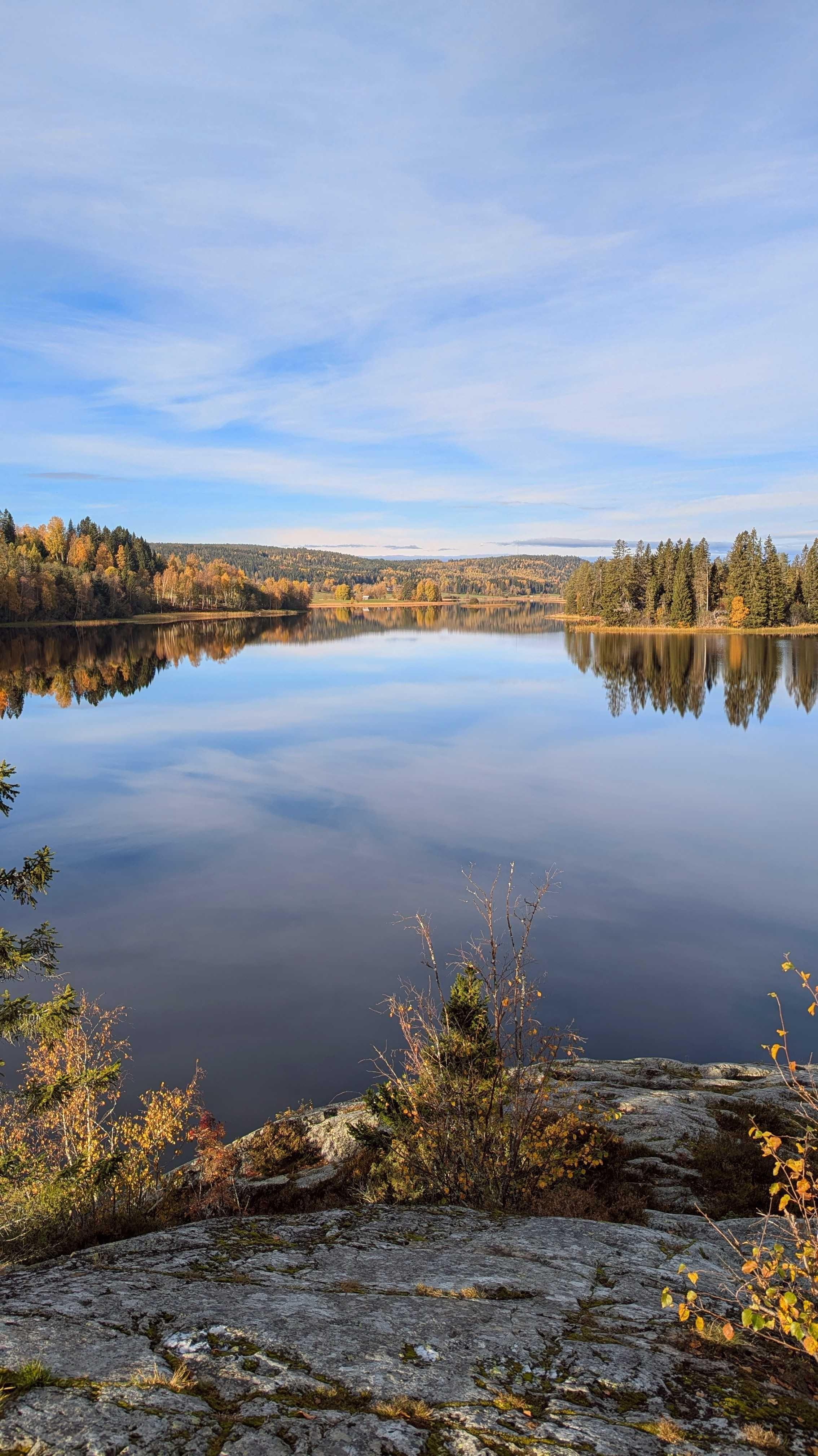 Autumn colors reflected in a lake in Sweden