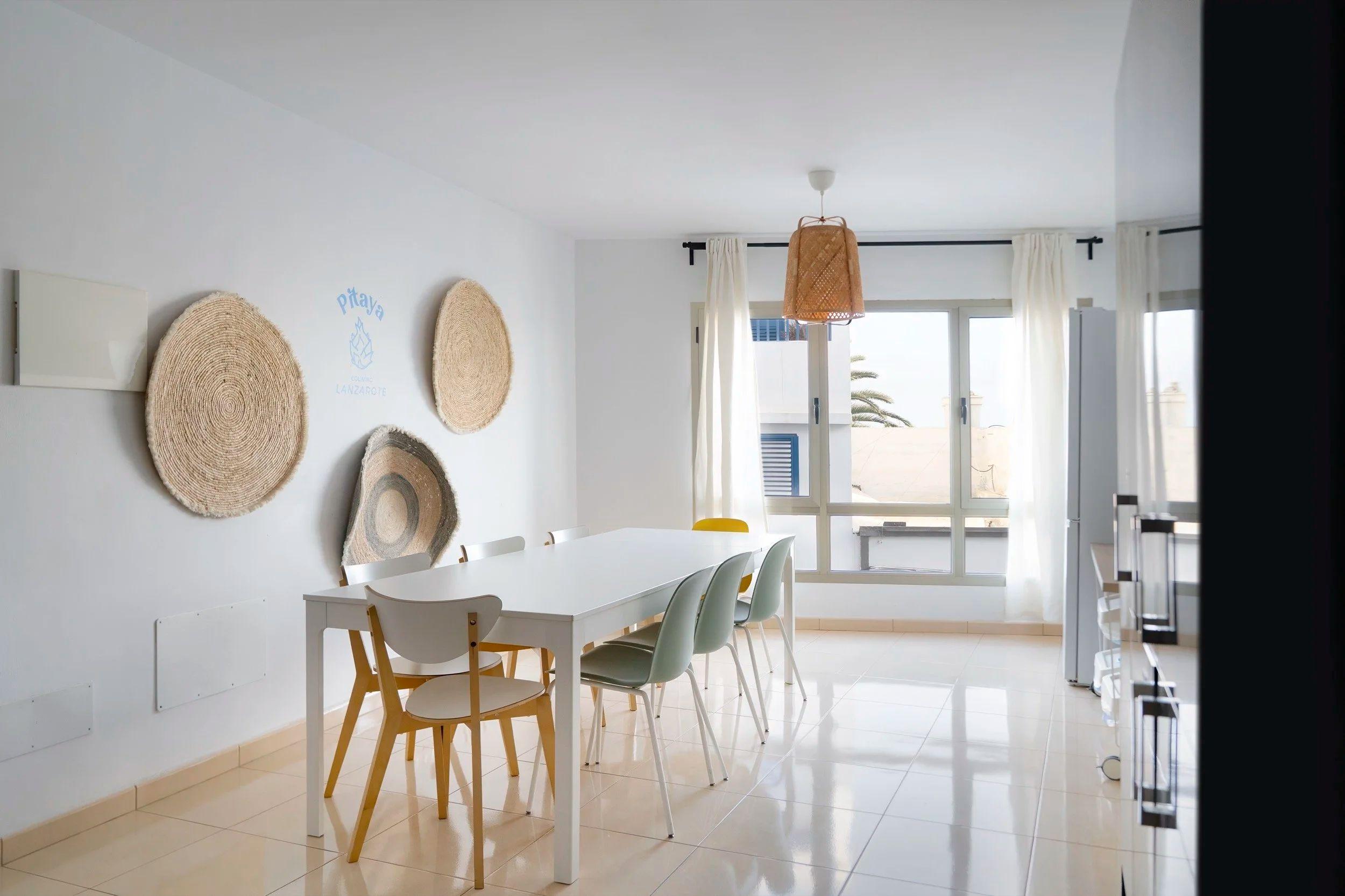 Spacious communal dining room at Pitaya Coliving where residents gather to share meals