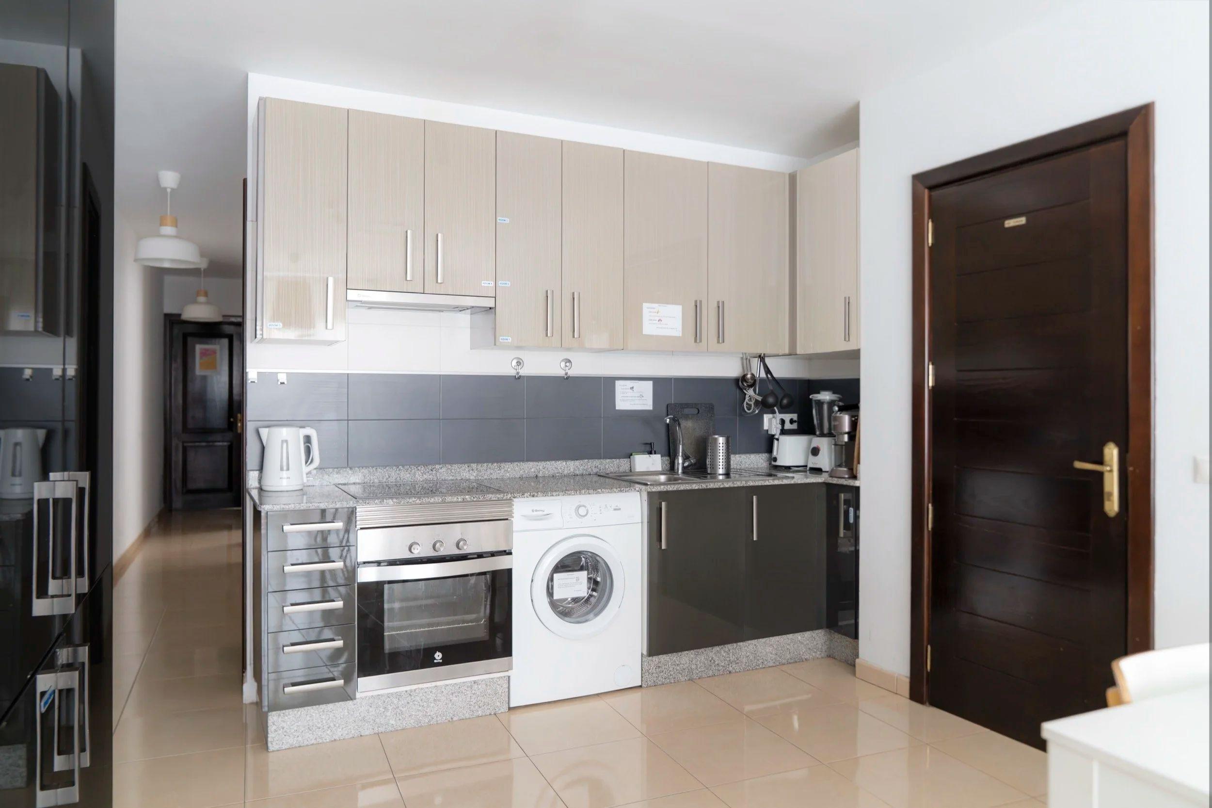 One of the two fully equipped kitchens at Pitaya Coliving with speciality coffee and Italian espresso machines