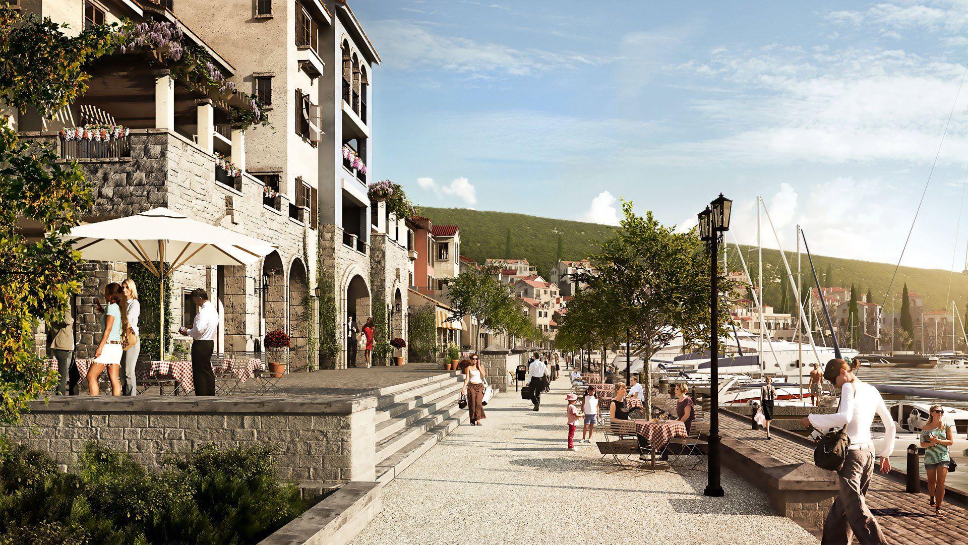 Lustica Bay marina promenade with cafes and boutiques