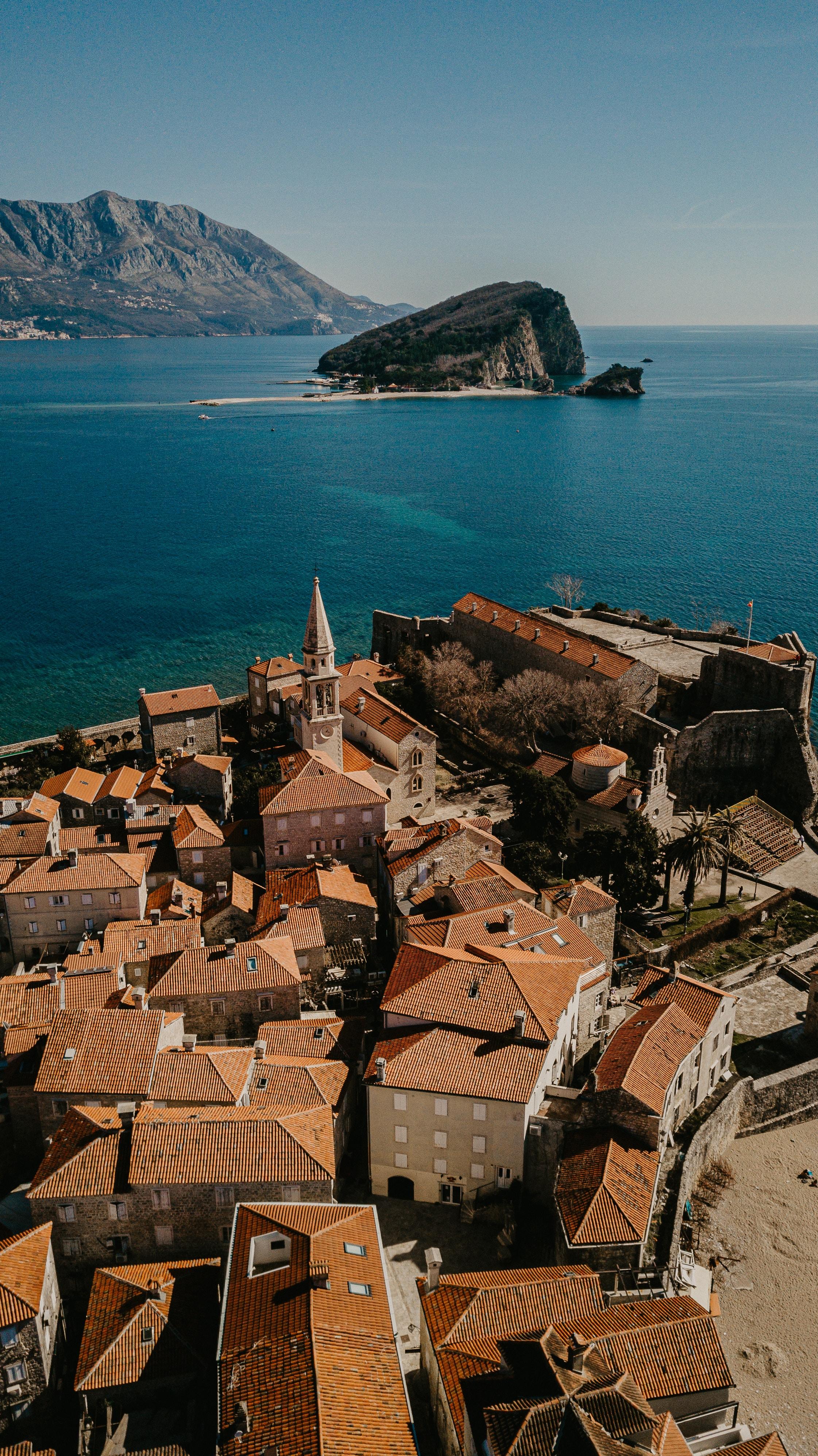 Aerial view of Budva Old Town with the Adriatic Sea and an island in the background