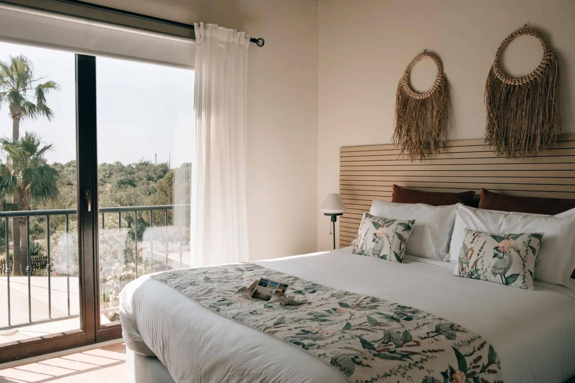 The double room upstairs filled with natural light, garden view